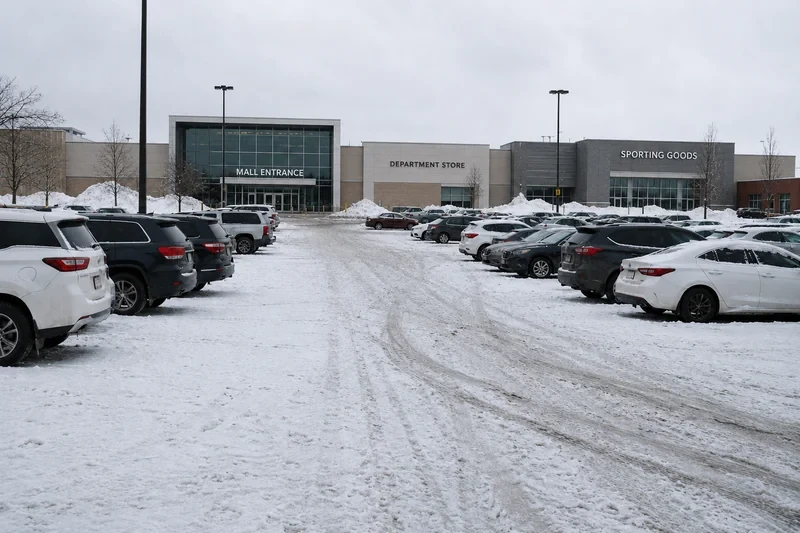 Commercial parking lot snow removal in Oakland County during winter